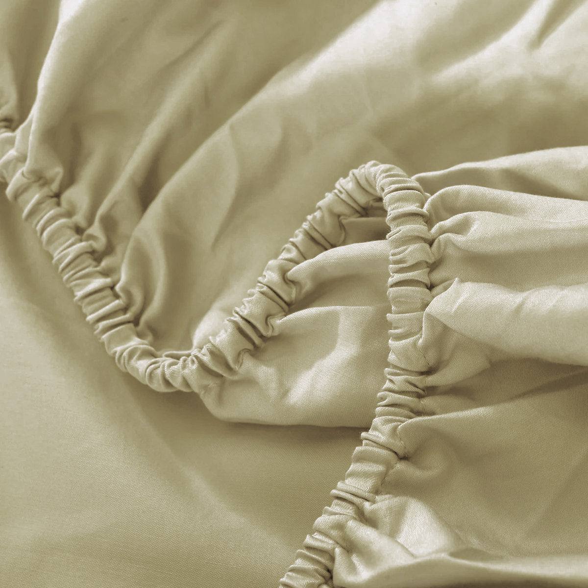 Khaki deep pocket fitted sheet elastic corner close-up